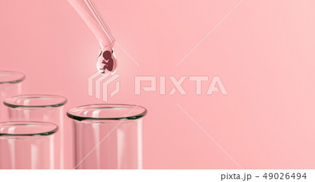 Artificial insemination. Test tube baby, IVF. On the tip of the pipette drop with silhouette of the 49026494
