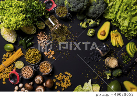 Set of fresh vegetables and fruits on black background. Detox diet. Different colorful fresh vegan 49028055