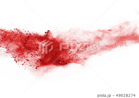 Red powder exploding, isolated on white background Red powder exploding, isolated on white background 49028274