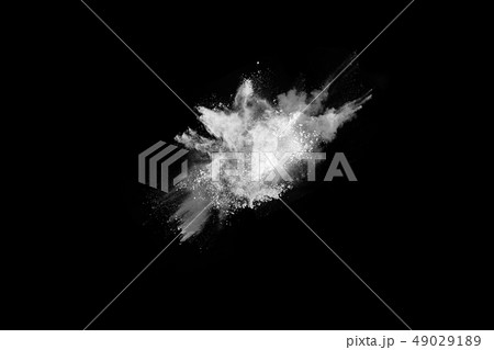 White powder explosion on black background. White powder explosion on black background. 49029189