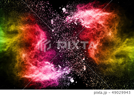 Abstract colored dust explosion on a black backgro Abstract colored dust explosion on a black backgro 49029943