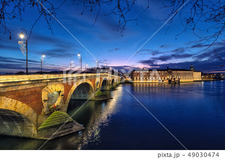 Pont Neuf at dusk in Toulouse, France 49030474