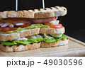 Toasted Triple Decker Club Sandwich with chicken, bacon 49030596