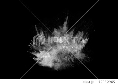 White powder explosion on black background. White powder explosion on black background. 49030965