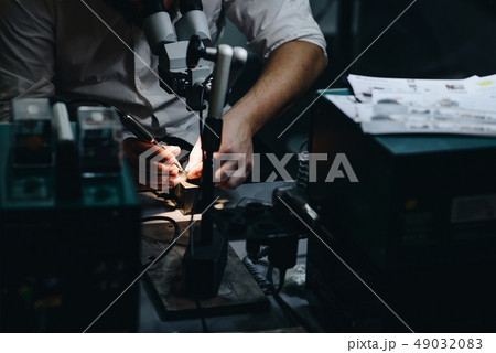 Man in his electrical workshop 49032083