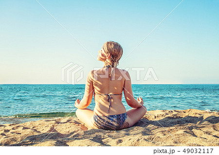 Happy girl relaxing on tropical sea beach 49032117