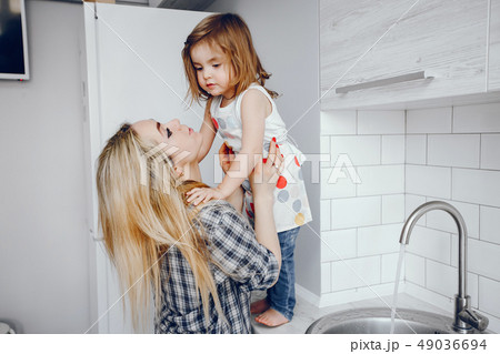 mother with daughter 49036694