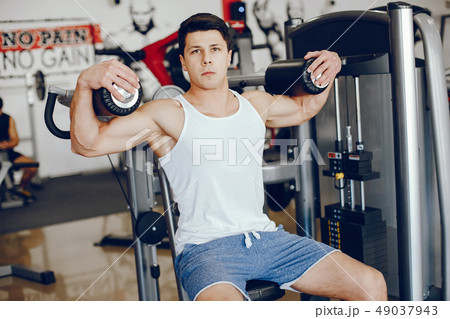 man in a gym man in a gym 49037943