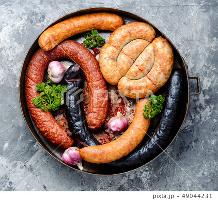 Smoked meats and sausages 49044231