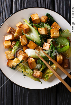 Asian veggie fried tofu with bok cho and sesame Asian veggie fried tofu with bok cho and sesame 49044896