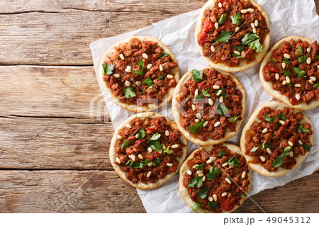 Lebanese Arab pizza with meat, tomatoes, spices Lebanese Arab pizza with meat, tomatoes, spices 49045312