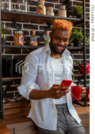 Handsome stylish man standing in the kitchen 49047332