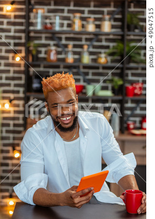 Positive delighted man being in a great mood Positive delighted man being in a great mood 49047515