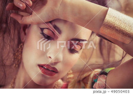 Close up stylized portrait of a Japanese geisha 49050403