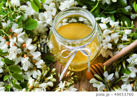 Acacia flowers and honey in the jar 49053760