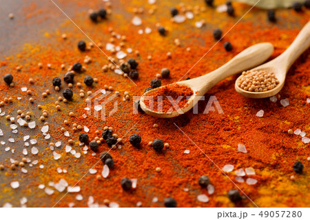 Spices and herbs on dark background Spices and herbs on dark background 49057280