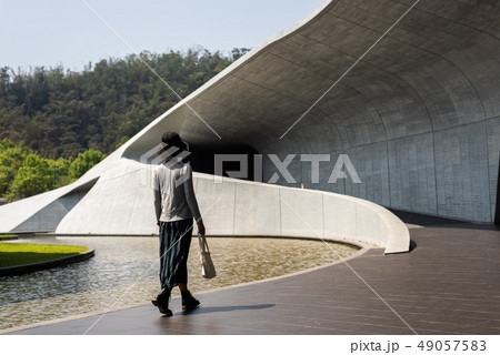 traveling woman walk at Xiangshan Visitor Center 49057583