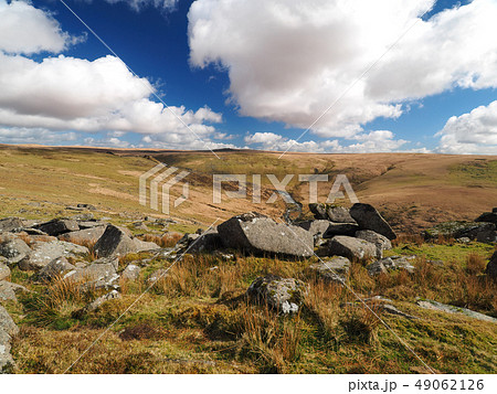 River Tavy cascades through Tavy Cleave with billowing clouds, Dartmoor National Park, Devon, UK 49062126