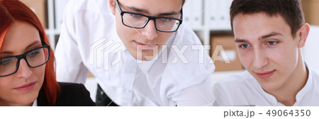 Group people sit in office deliberate on problem Group people sit in office deliberate on problem 49064350