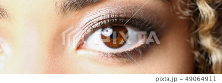 Eye of a black woman shot large macro beauty  49064911