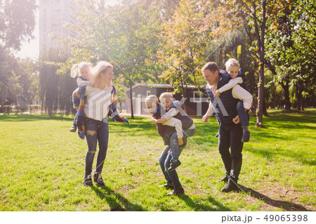 Theme family active leisure outside in nature. large Caucasian family with four children. Mom and 49065398