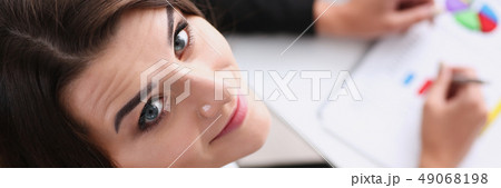 Beautiful smiling cheerful girl at workplace 49068198