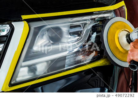 Car headlights with power buffer machine at servic Car headlights with power buffer machine at servic 49072292