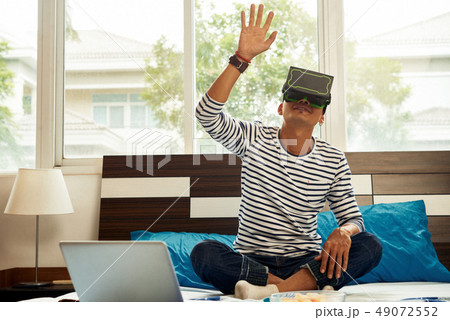 Man in vr goggles Man in vr goggles 49072552