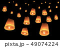 vector of floating lanterns on black background 49074224