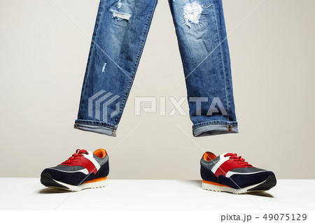 Fashionable sneakers and jeans set Fashionable sneakers and jeans set 49075129