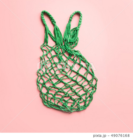 Empty shopping bag on pink. Zero waste concept. Empty shopping bag on pink. Zero waste concept. 49076168