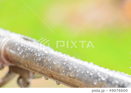 water drops on old metallic steel pipe aluminum 49076600