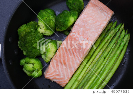 salmon with broccoli and asparagus 49077633
