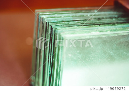 a stack of glass 49079272