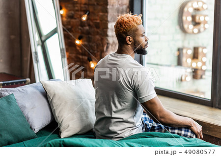 Nice good looking man waking up in the morning 49080577