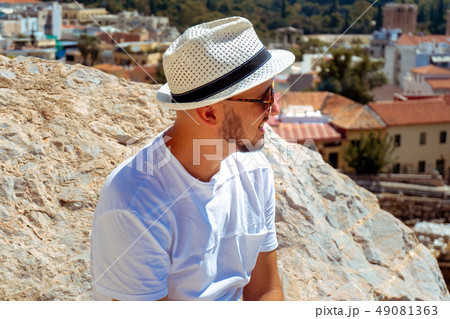 stylish man smiles away on the street stylish man smiles away on the street 49081363