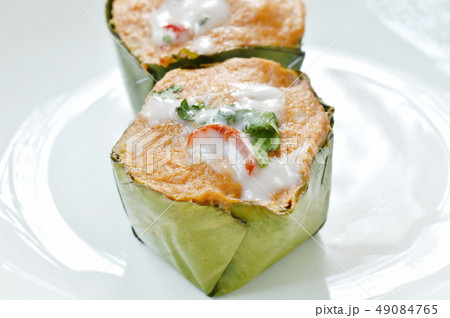 steamed fish with curry paste in banana leaf tray steamed fish with curry paste in banana leaf tray 49084765