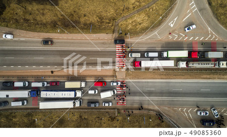 Strike and protest of people. Blocked the road. Crowd of annoyed protesters blocking road with Strike and protest of people. Blocked the road. Crowd of annoyed protesters blocking road with 49085360