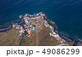 Top view of a coast. The buildings of the island 49086299