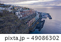 Top view of a coast. The buildings of the island 49086302