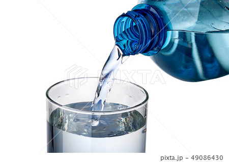 Water pouring into a glass Water pouring into a glass 49086430