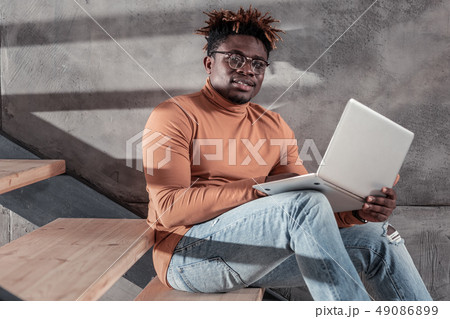 Portrait of handsome male that posing on camera Portrait of handsome male that posing on camera 49086899