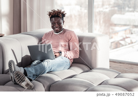 Handsome brunette male person looking at camera Handsome brunette male person looking at camera 49087052