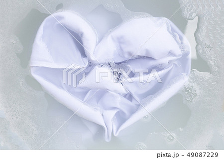 Soak a cloth before washing, white cloth Soak a cloth before washing, white cloth 49087229