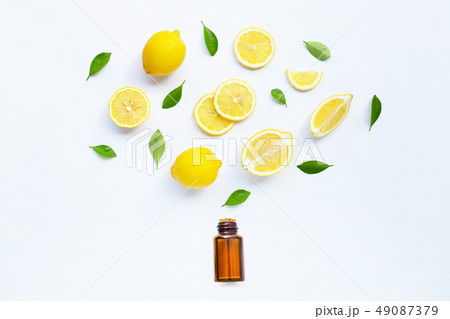 Lemon and slices with essential oil isolated on Lemon and slices with essential oil isolated on 49087379