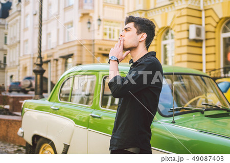 Portrait of a model young handsome sexy male brunette guy with dark skin Turkish Middle Eastern Portrait of a model young handsome sexy male brunette guy with dark skin Turkish Middle Eastern 49087403