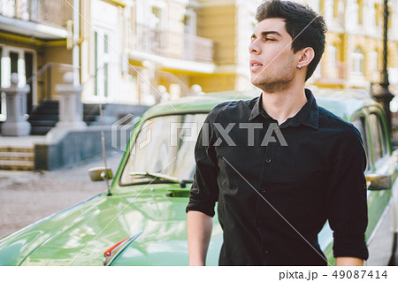 Portrait of a model young handsome sexy male brunette guy with dark skin Turkish Middle Eastern 49087414