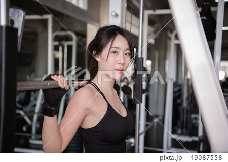 Exercise concept. A beautiful girl is exercising 49087558