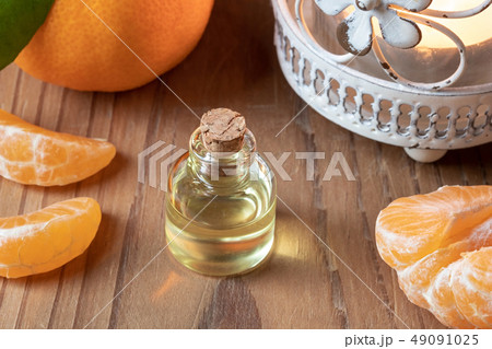 A bottle of tangerine essential oil  49091025