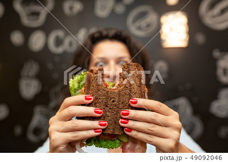 Closeup funny blurred protrait of young woman hold Closeup funny blurred protrait of young woman hold 49092046